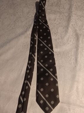 Damo Black Tie with Silver Medallion and Diagonal Stripes